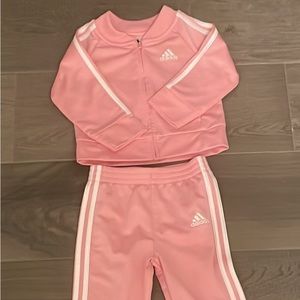12 month polyester baby girl outfit. Worn 1 time.